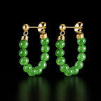 Vivid green jadeite bead hoop earrings with gold plated silver studs