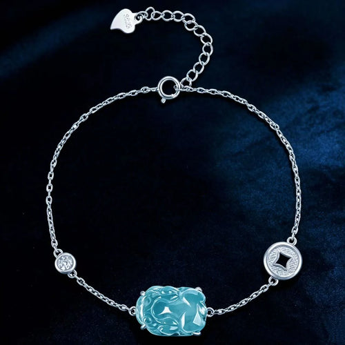 Blue jadeite Pixiu bracelet worn by woman