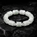 Pale Green Carved Jadeite Barrel Bracelet