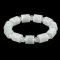 Pale Green Carved Jadeite Barrel Bracelet