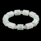 Pale Green Carved Jadeite Barrel Bracelet