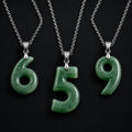 Green jade number pendants 6 5 and 9 with silver chains