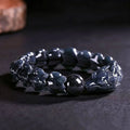 Natural Burmese Black Chicken jade bracelet worn by man