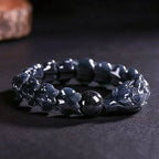 Natural Burmese Black Chicken jade bracelet worn by man