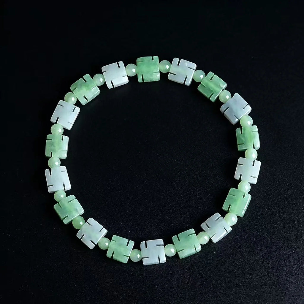 Natural Burmese jade bracelet with green and white carved beads