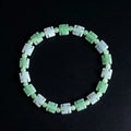 Natural Burmese jade bracelet with green and white carved beads