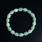 Natural Burmese jade bracelet with green and white carved beads