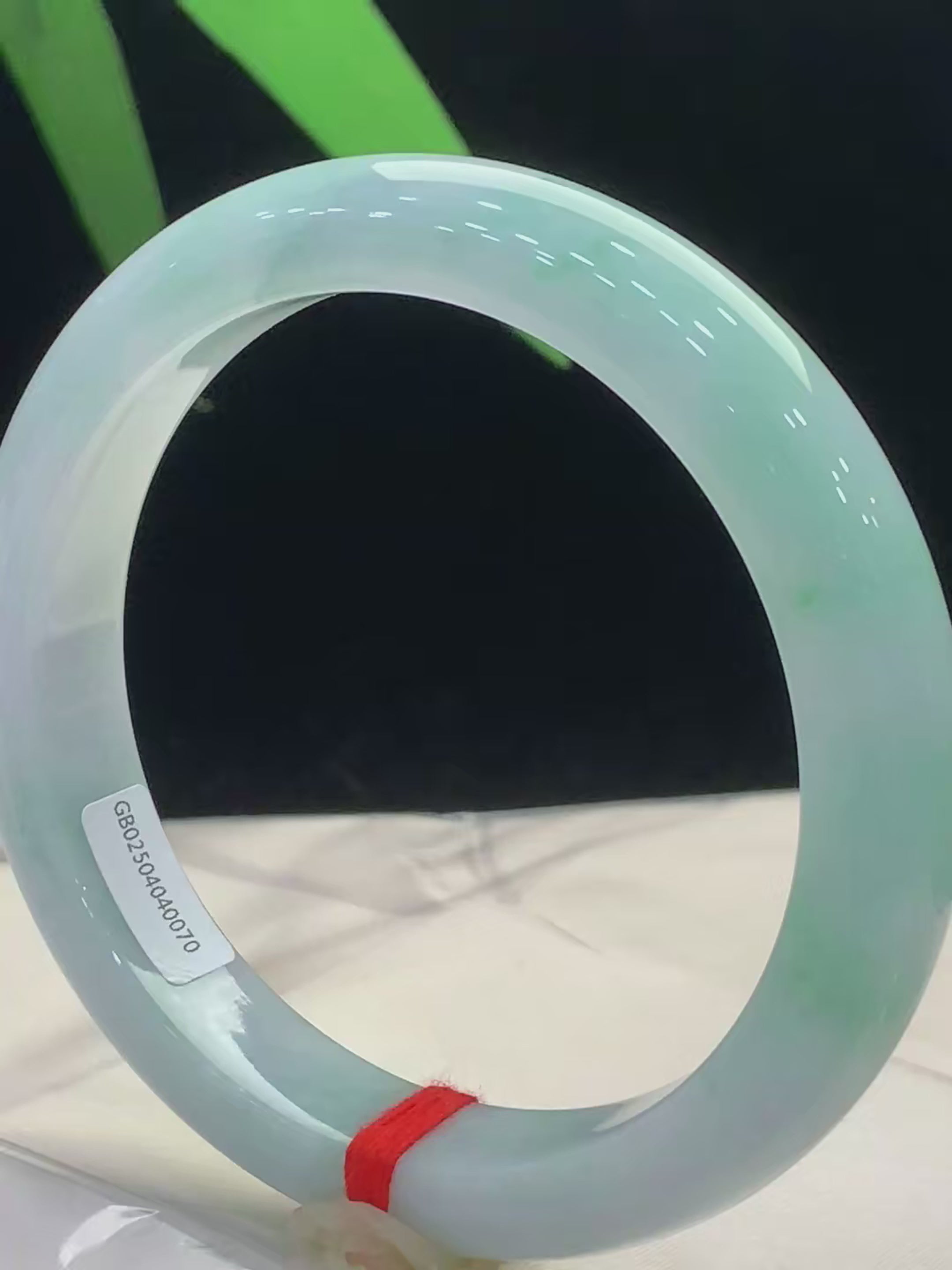 Luxury-Floating-Green-Jade-Bangle-Black-Background-Natural-Style